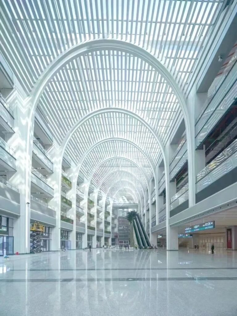 Steel and PTFE membrane connection details for large-scale railway hub