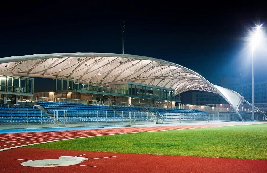 Beijing Daxing Jinghua School stadium with iconic ETFE membrane roof and running track